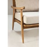 modern armchair with rattan back and linen seat and back cushion