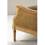 French style wingback chair with rattan detail