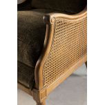 French style wingback chair with rattan detail