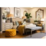 Round deep buttoned ottoman in velvet