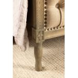 French style bed with deep button detail upholstered in linen