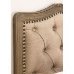 French style bed with deep button detail upholstered in linen