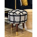 Black shaggy upholstered stool with wooden legs