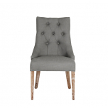 grey upholstered dining chair with buttoned back detail oak legs Château Collection