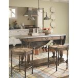 wooden kitchen island with 2 counter chairs