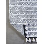 Block & Chisel natural black and white carpet with tassels