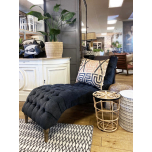 charcoal buttoned chaise with wooden feet