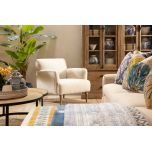 Upholstered armchair with wooden legs linen