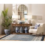 Upholstered armchair with wooden legs linen