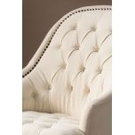 cream upholstered deco chair with deep buttoned detail, oak legs and castors, Château Collection 