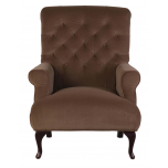 Deep tufted armchair with wooden legs