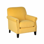 fully upholstered armchair in yellow velvet with stud detail