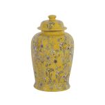 Yellow ginger jar with daisy pattern