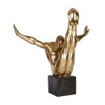 golden driver in mid air statue in mini plinth