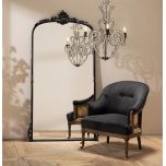 Deconstructed occasional chair with castors, upholstered in charcoal fabric