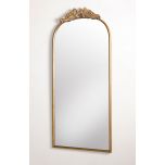 Gold framed mirror with ornate top