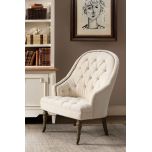 cream upholstered deco chair with deep buttoned detail, oak legs and castors, Château Collection 