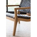 Block and chisel teak and leather armchair