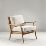 modern armchair with rattan back and linen seat and back cushion