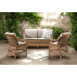 Outdoor armchair in synthetic rattan with cushions