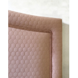 upholstered headboard in rose velvet fabric