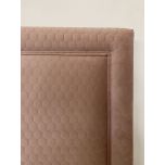upholstered headboard in rose velvet fabric