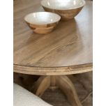 Round dining table in solid weathered oak