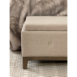 Cleopatra Bed end in cream linen with tufted detail and wooden legs with convertible trays
