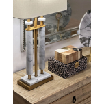 Twin-column marble and gold lamp base with linen shade