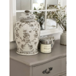 Brown and white ginger jar with beige elephant print
