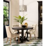 dark wood round dining table with decorative base Château Collection 