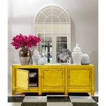 yellow lacquered sideboard with cupboards