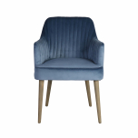 velvet upholstered armchair with wooden legs