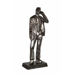 Metal man on stand