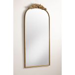 Gold framed mirror with ornate top