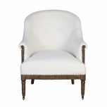 Deconstructed occasional chair with castors, upholstered in ivory fabric.