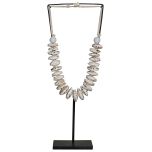 Block & Chisel shell chain on metal stand