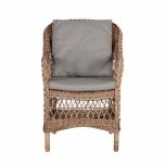 Outdoor armchair in synthetic rattan with cushions