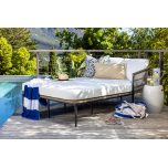 Outdoor sunbed in synthetic rattan and sunproof cushions