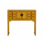 yellow lacquered asian inspired console