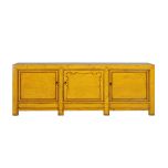 yellow lacquered sideboard with cupboards