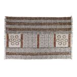 cotton rug with rust flowers