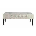 green and grey upholstered ottoman with wooden legs