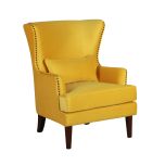 Burnley wingback chair in yellow velvet