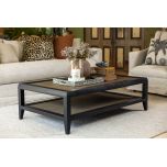 black frame coffee table with rattan inlay and bottom shelf