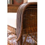 Block and chisel cane armchair with back and seat cushions
