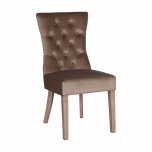 Upholstered brown velvet dining chair with button back detail and wooden legs.