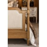 wooden 4 poster bed with fabric headboard and footboard