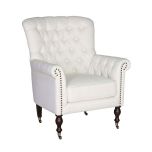white tufted armchair in classic vanilla
