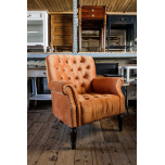 Block & Chisel orange velvet upholstered lounge chair